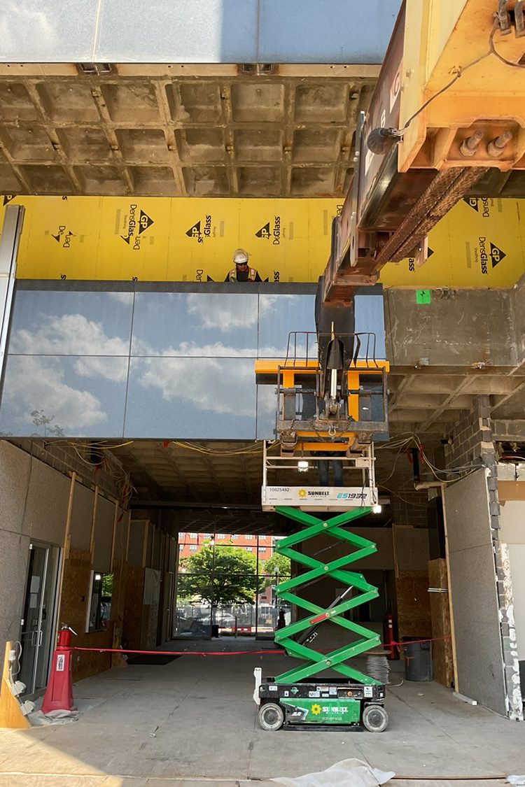 Crews working on demolition at 111 Massachusetts Avenue in Washington DC