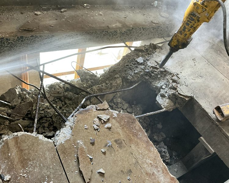 Robotics 3 Breaking up cement with BROKK robotics