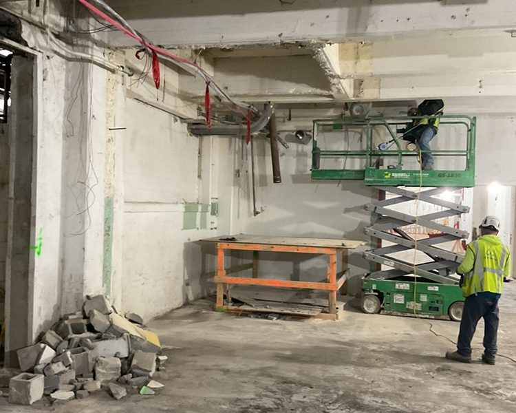 Scissor Lift Interior demolition at the historic mill