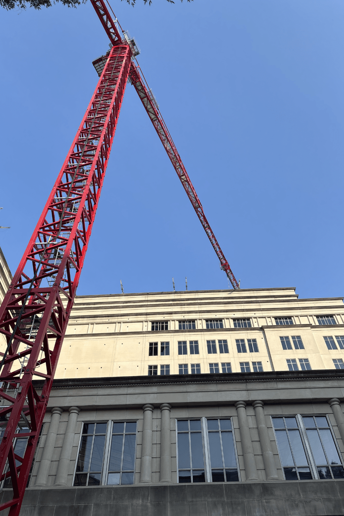 A crane over top of the Incyte Building in Willmington DE during remodeling.