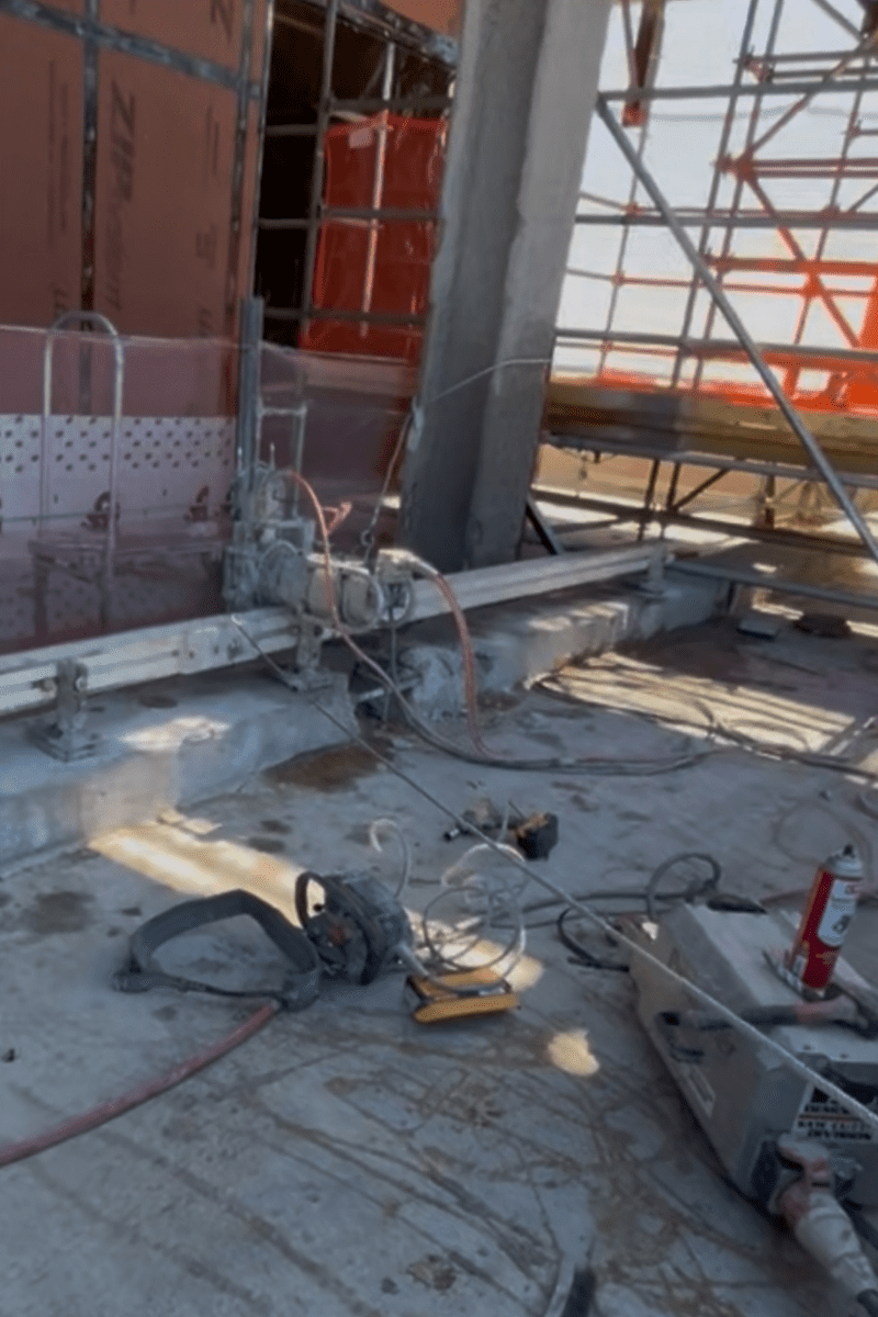 Track saw set up during demolition for the removal of large cast cement