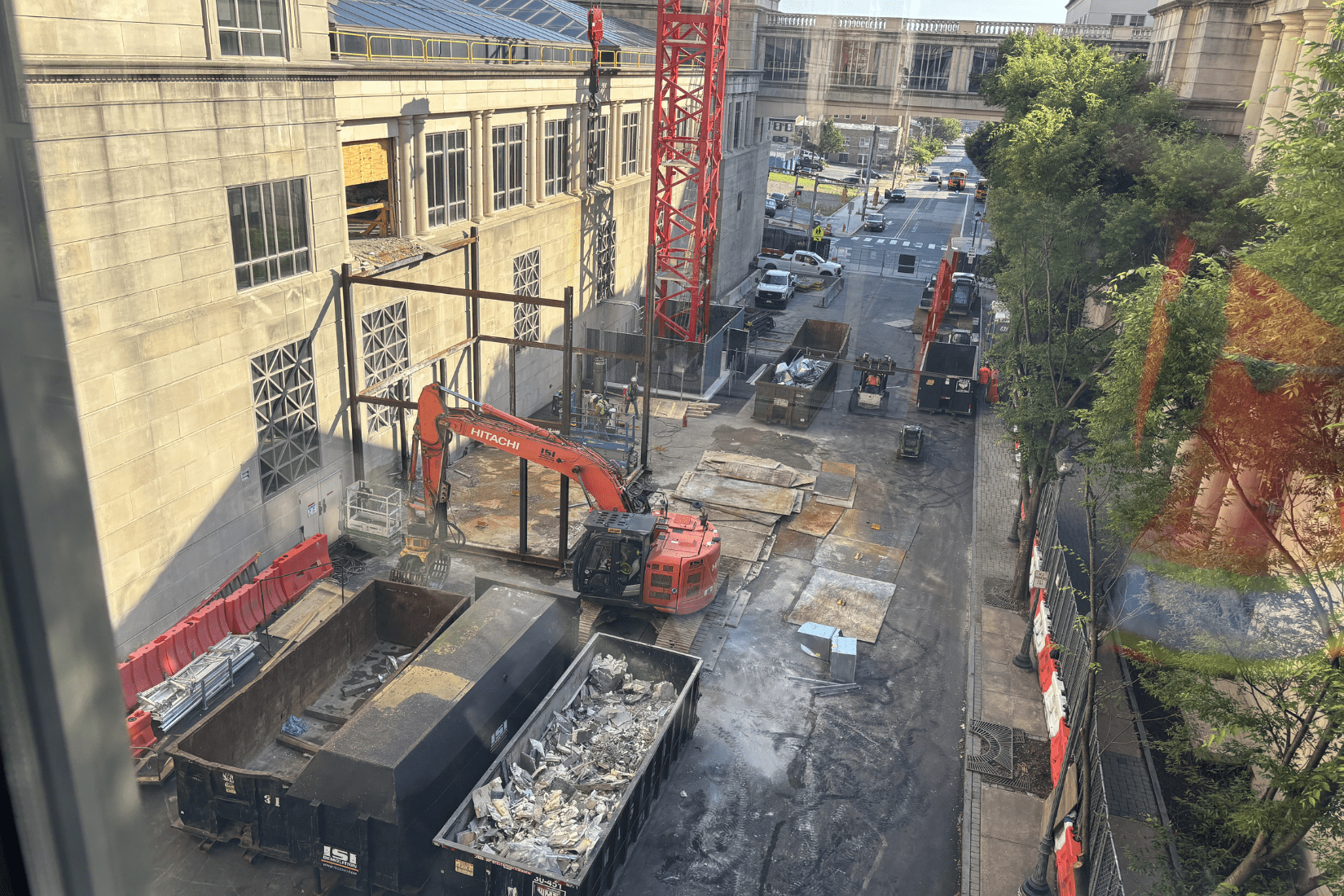 Tight staging area near the structural demolition of an office building