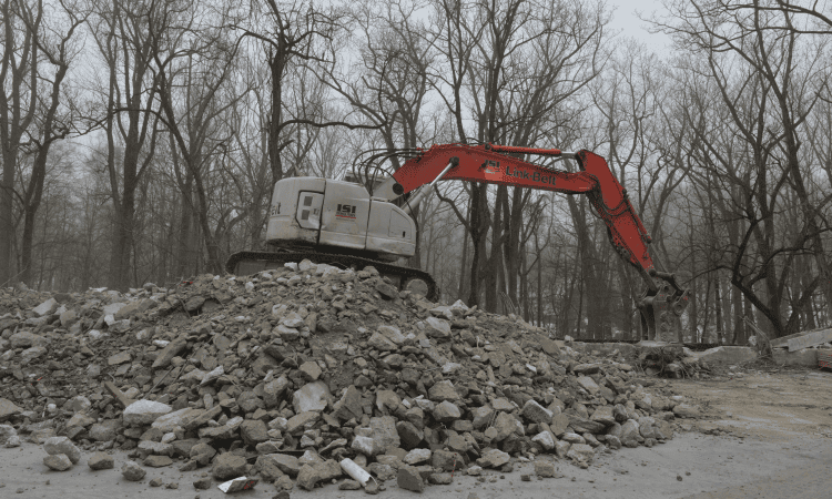 excavator sorting crushed concrete