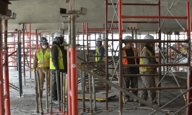 crews standing in the secured space