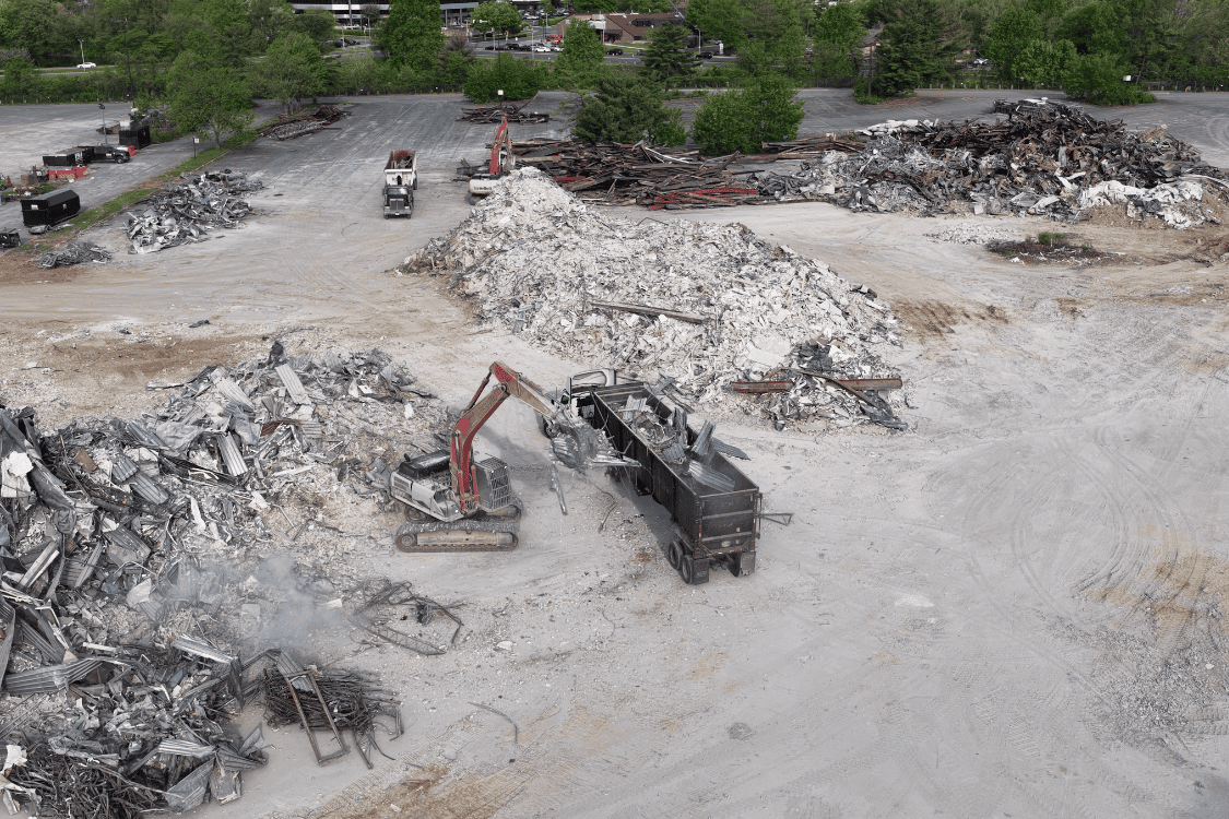 Excavator during mall entrance demolition