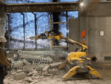 Brokk removing block and brick walls